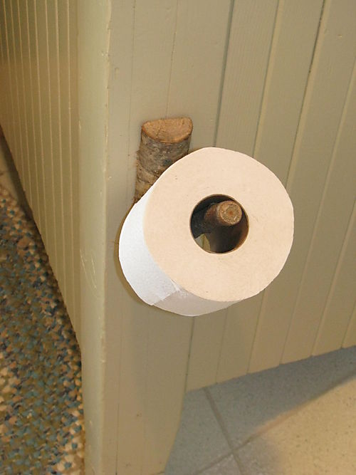 Tree branch toilet tissue holder