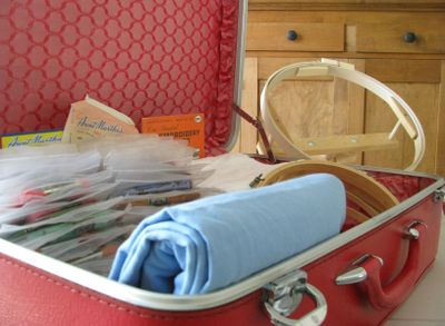 Suitcase with embroidery supplies
