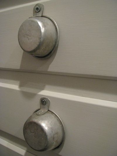 Measuring cup drawer pulls