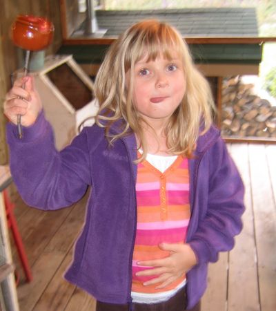 Maeve with caramel apple