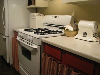 Kitchen cabinets hollyhock red