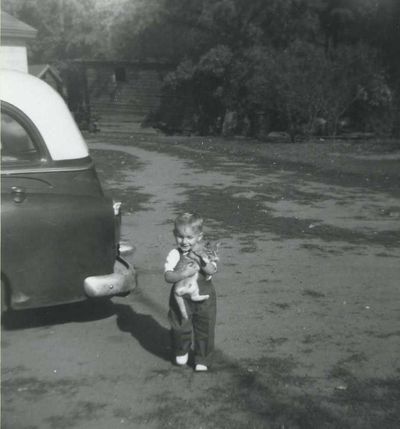 Rick_carrying_cat_at_farm