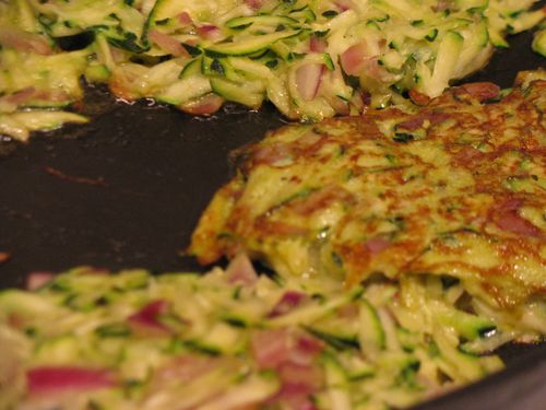 Zucchini patties browning